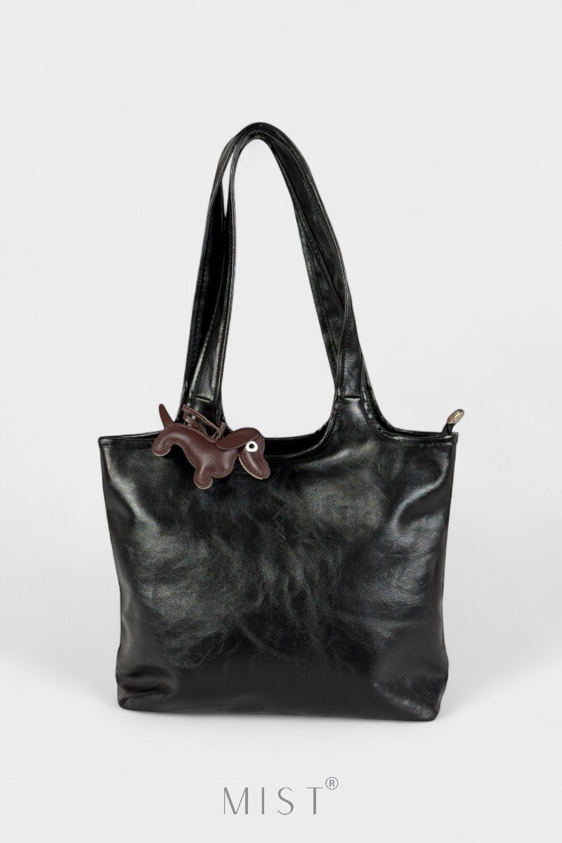 Tomm Noire + Charm