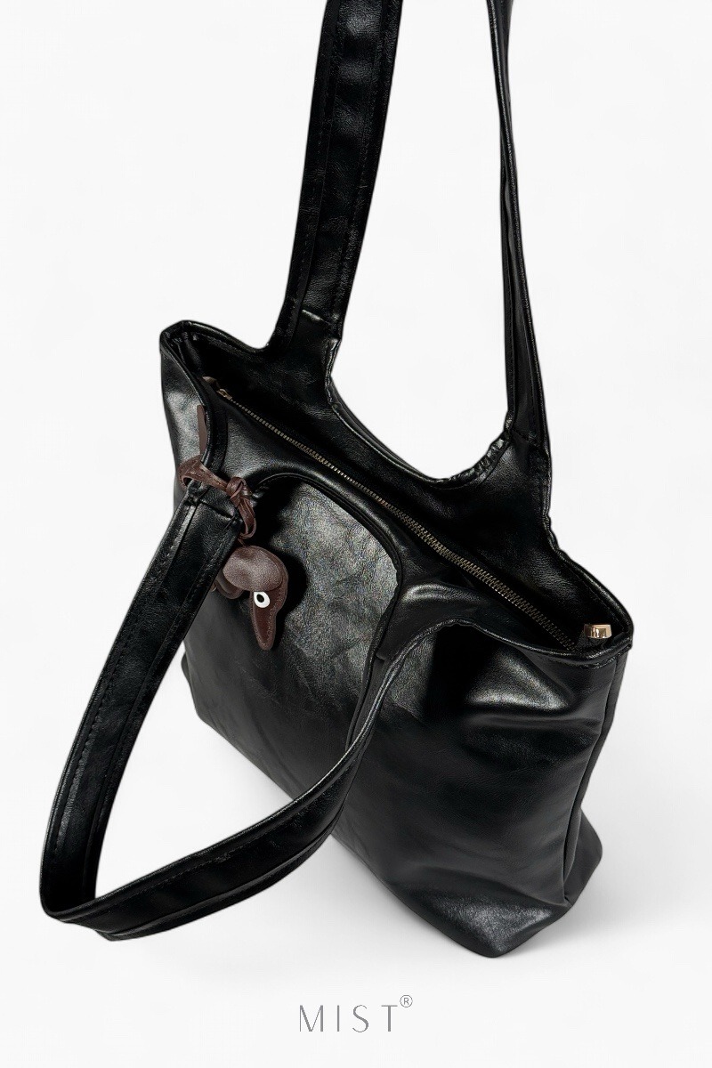 Tomm Noire + Charm
